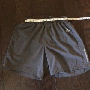 Gray Adidas running shorts